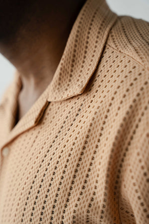 Camp collar detail on premium men's textured resort shirt