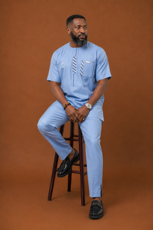 Close-up embroidery detail on premium sky blue senator wear