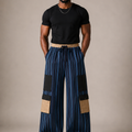 Akin Aso Oke cargo pant with oversized wide-leg fit in premium navy blue striped fabric