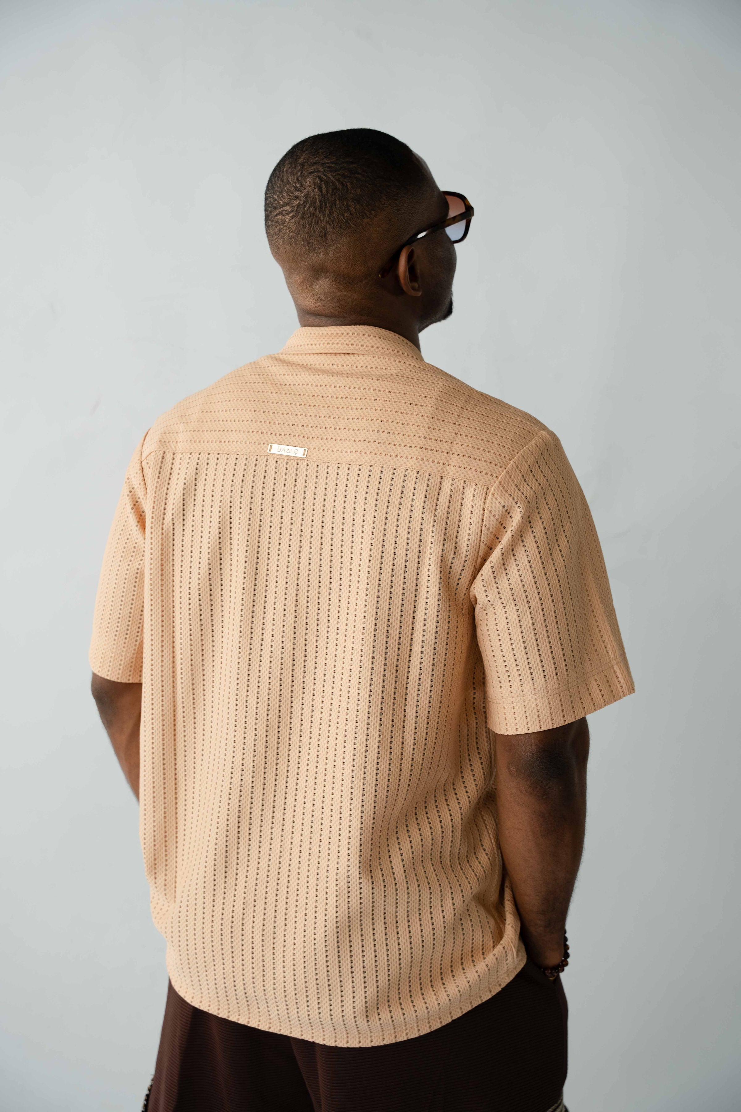 Men's textured resort shirt in sand beige with camp collar styling