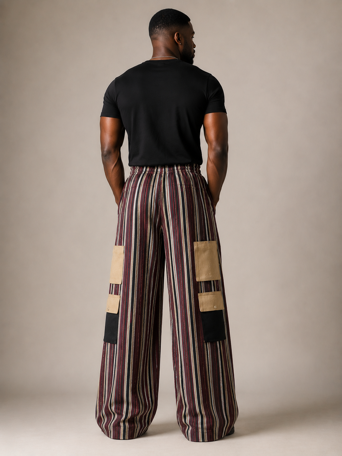 Back view of Olu oversized Aso Oke cargo trousers by Baale Vogue