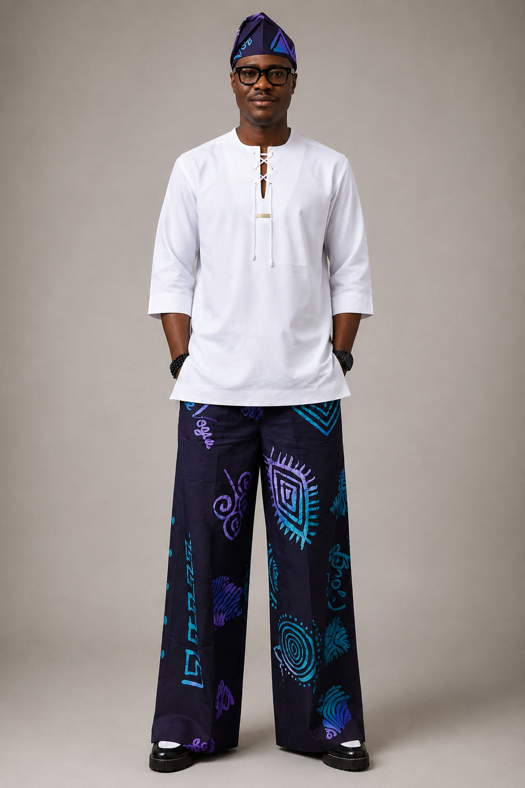 White lace-up tunic shirt styled in contemporary African menswear