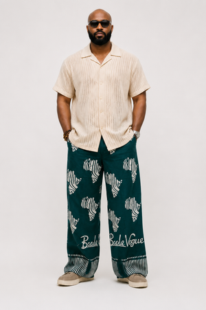 Close-up of Baale Vogue Afri'Pant Adire wide-leg trousers in brown showcasing the signature Adire print and premium craftsmanship.