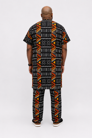 Back view of Baale Vogue men's African print danshiki outfit with matching trousers, highlighting the continuous geometric Ankara pattern