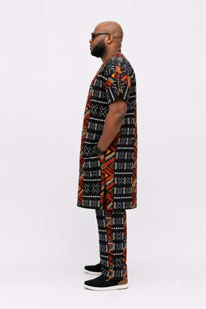Side profile of Baale Vogue luxury men's African print danshiki outfit in black Ankara fabric with relaxed tailored fit.