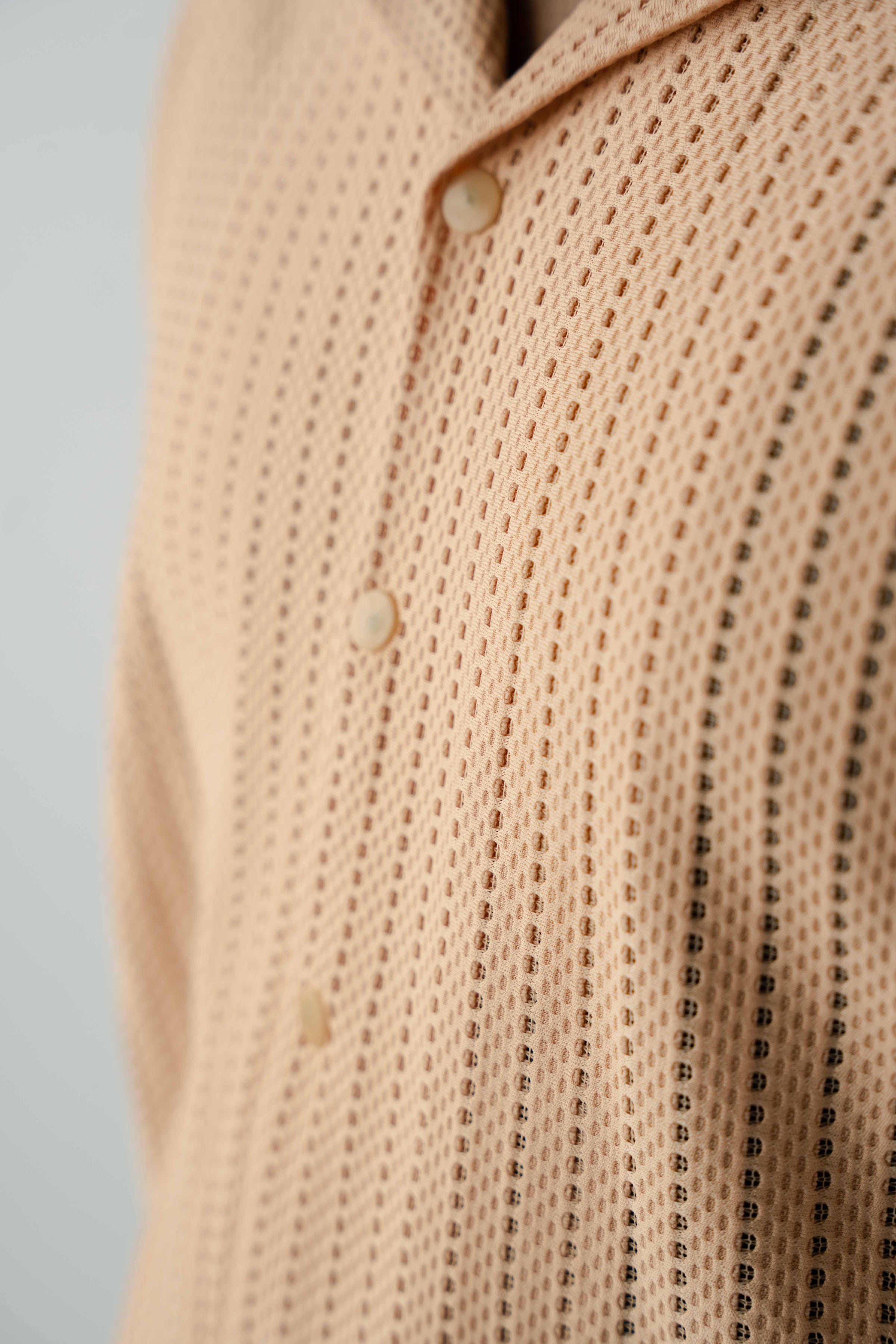 Men's textured resort shirt styled with wide-leg Aso Oke cargo trousers